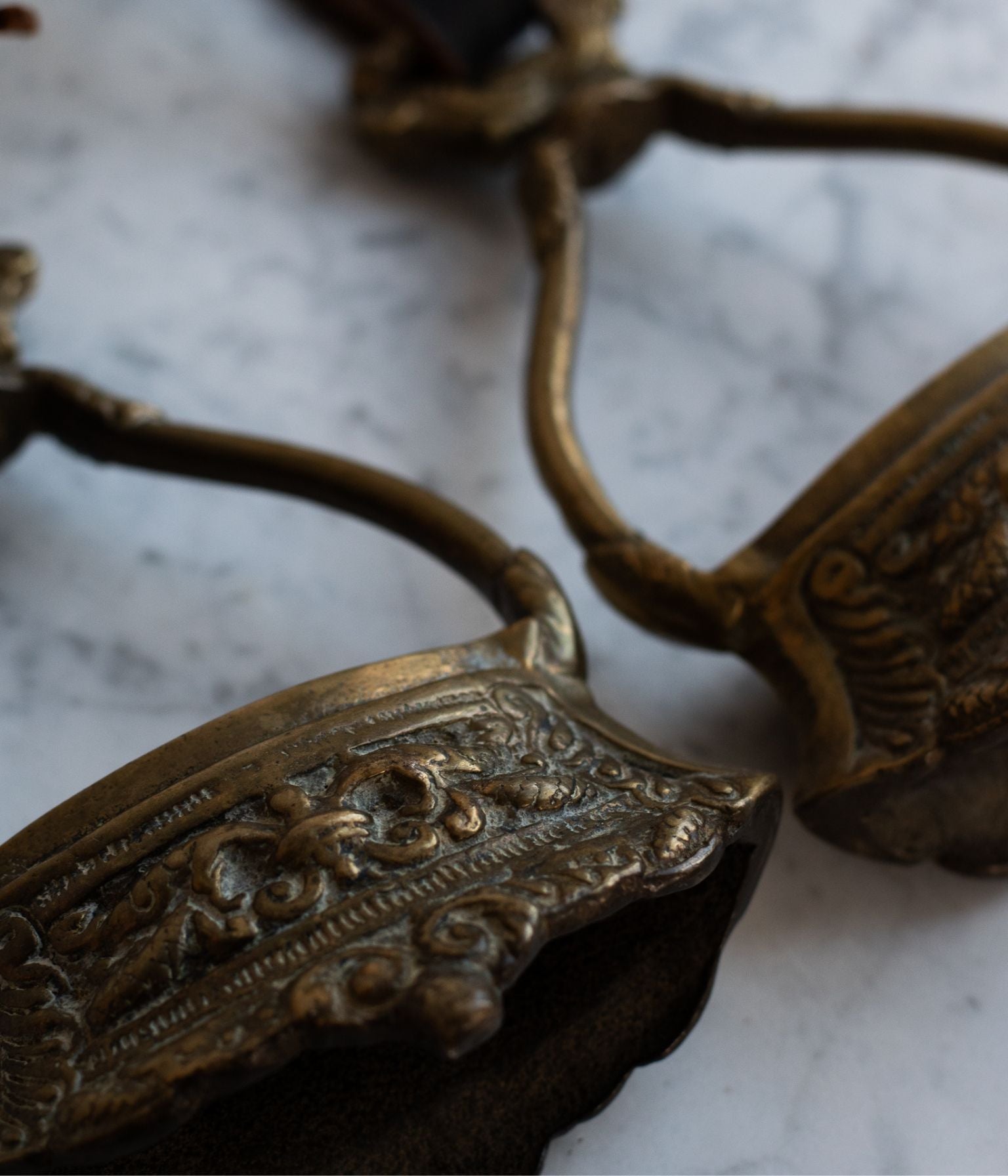 19th Century Pair of Ornate Brass Stirrups with Original Leather Straps