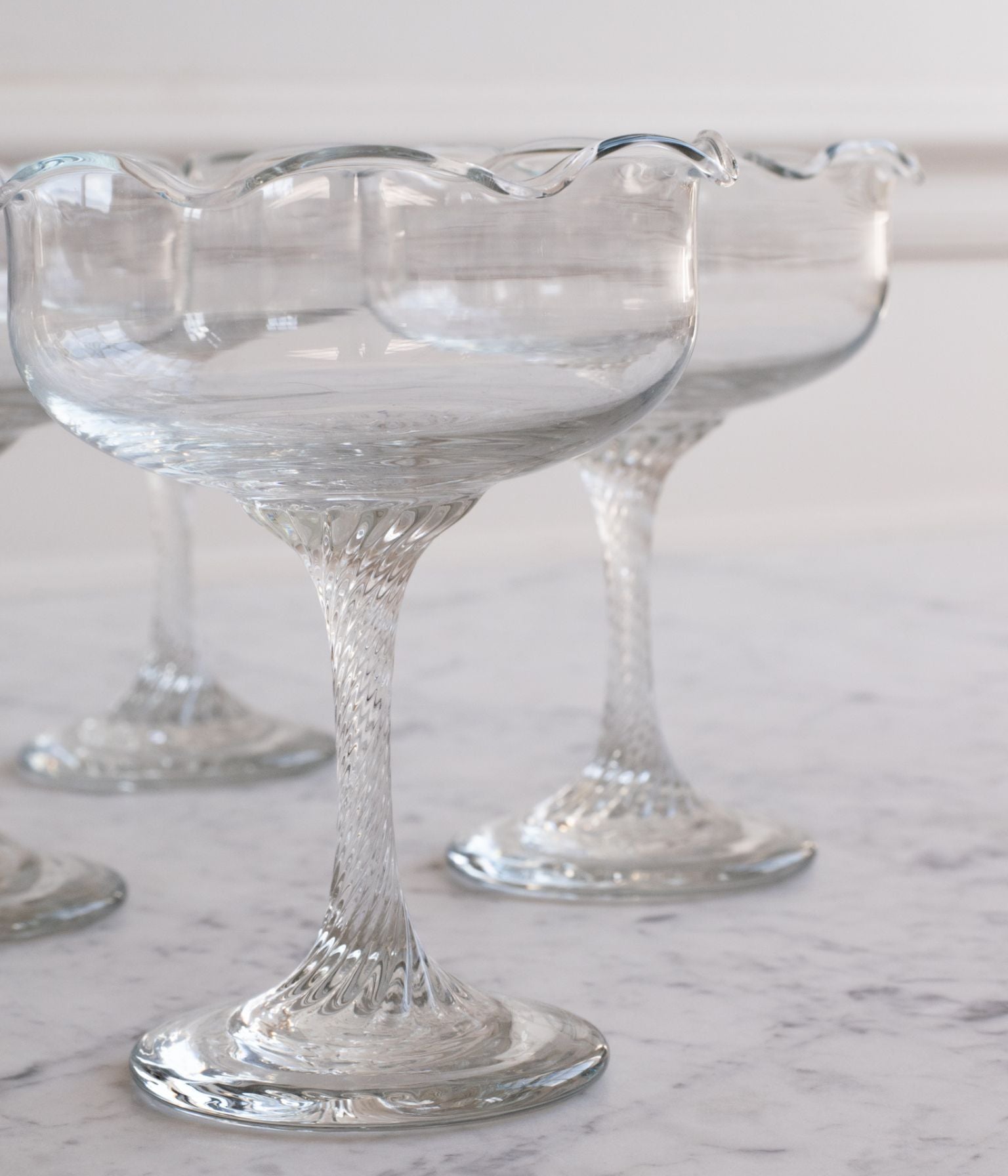 Set of Four Vintage Glass Dessert Coupes with Petal Rim and Twisted Stem