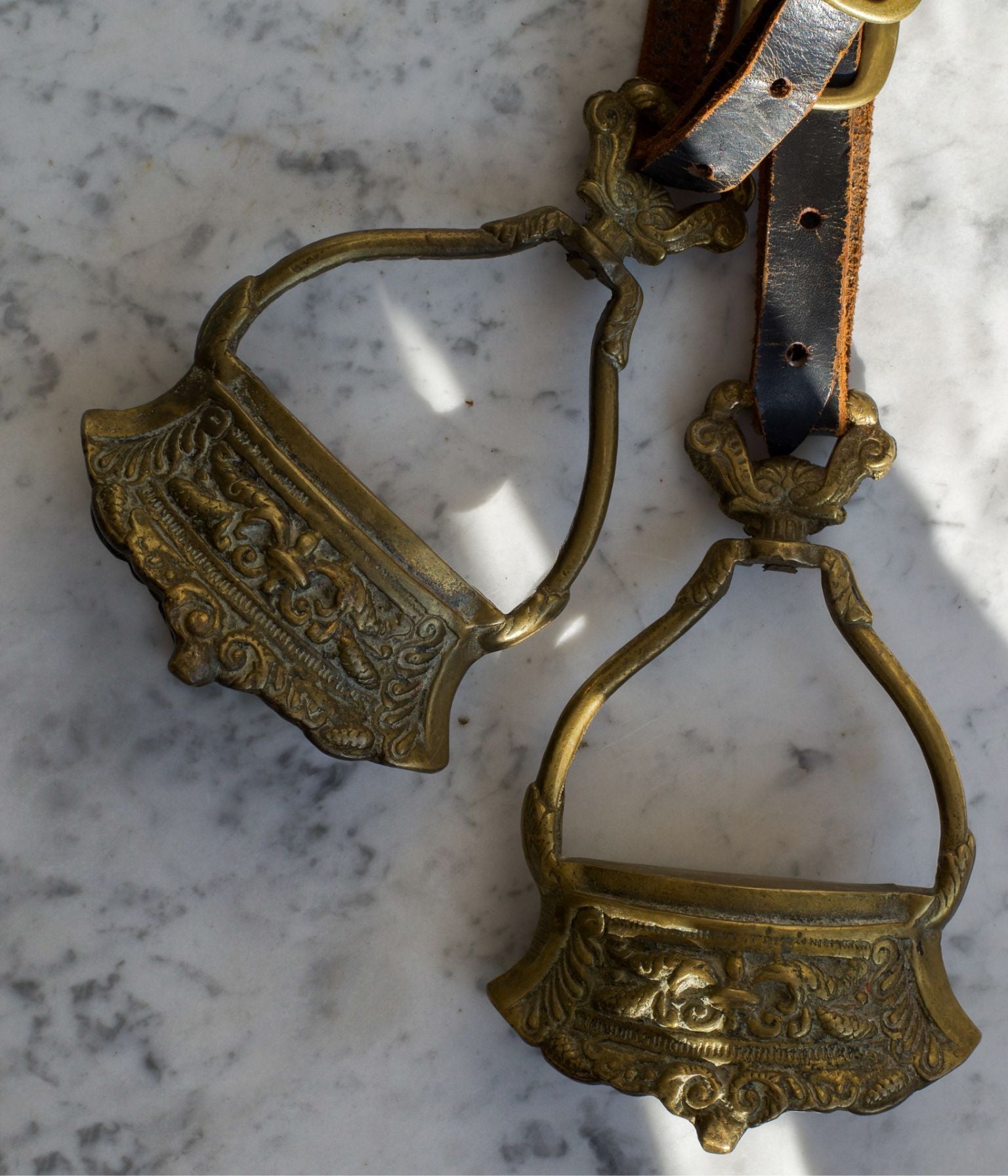 19th Century Pair of Ornate Brass Stirrups with Original Leather Straps