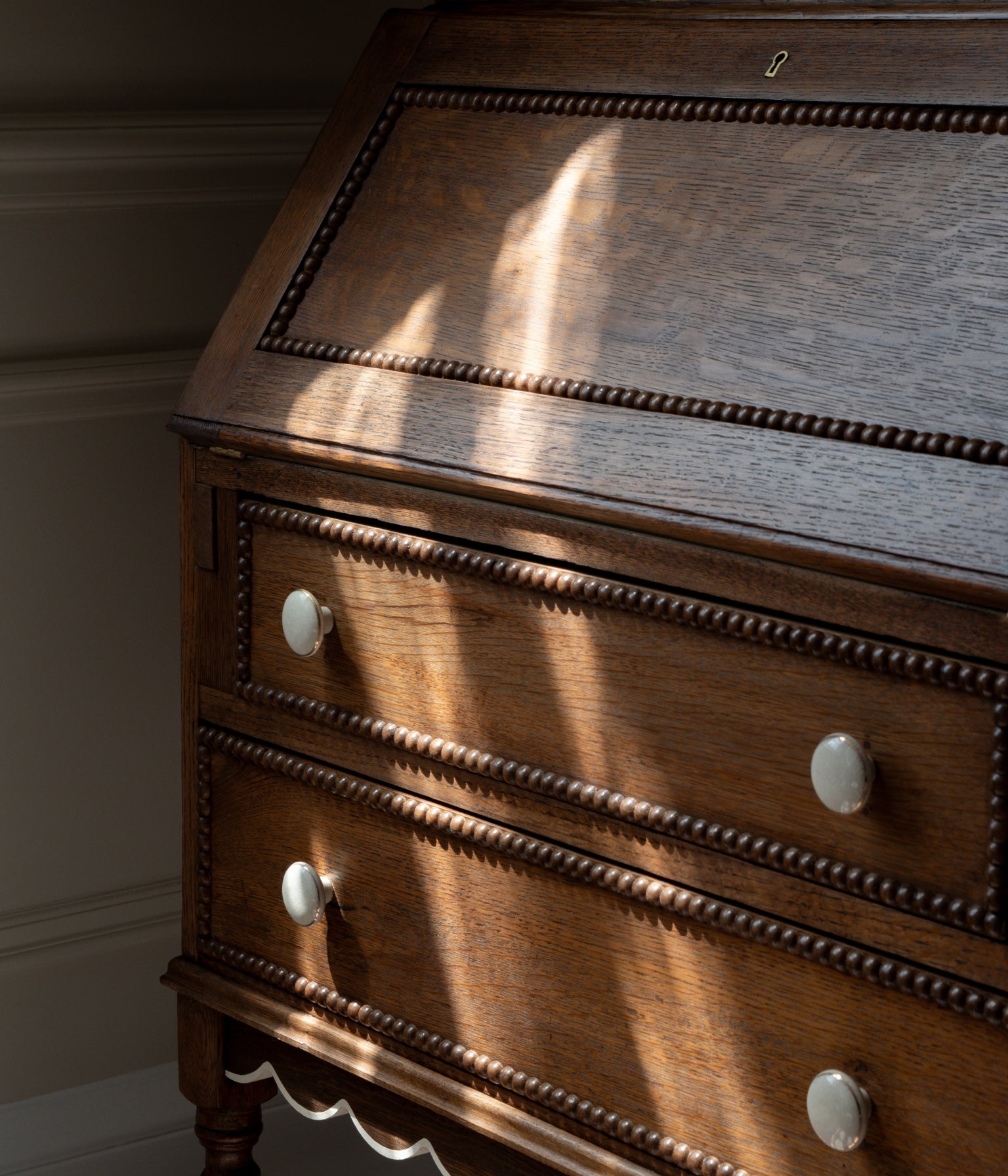 Antique Solid Oak Library Bookcase Bureau with Scalloped Edge, Bobbin Trim & Rattan Doors