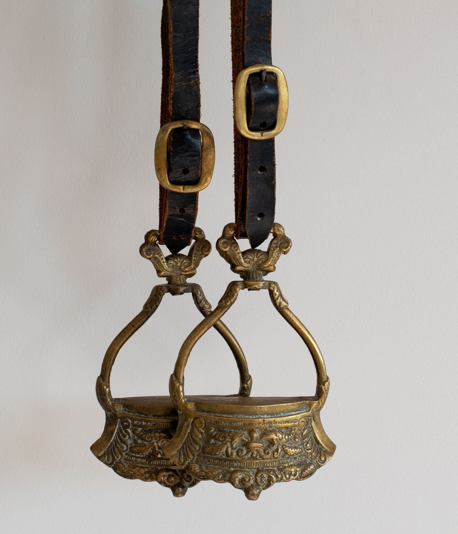 19th Century Pair of Ornate Brass Stirrups with Original Leather Straps
