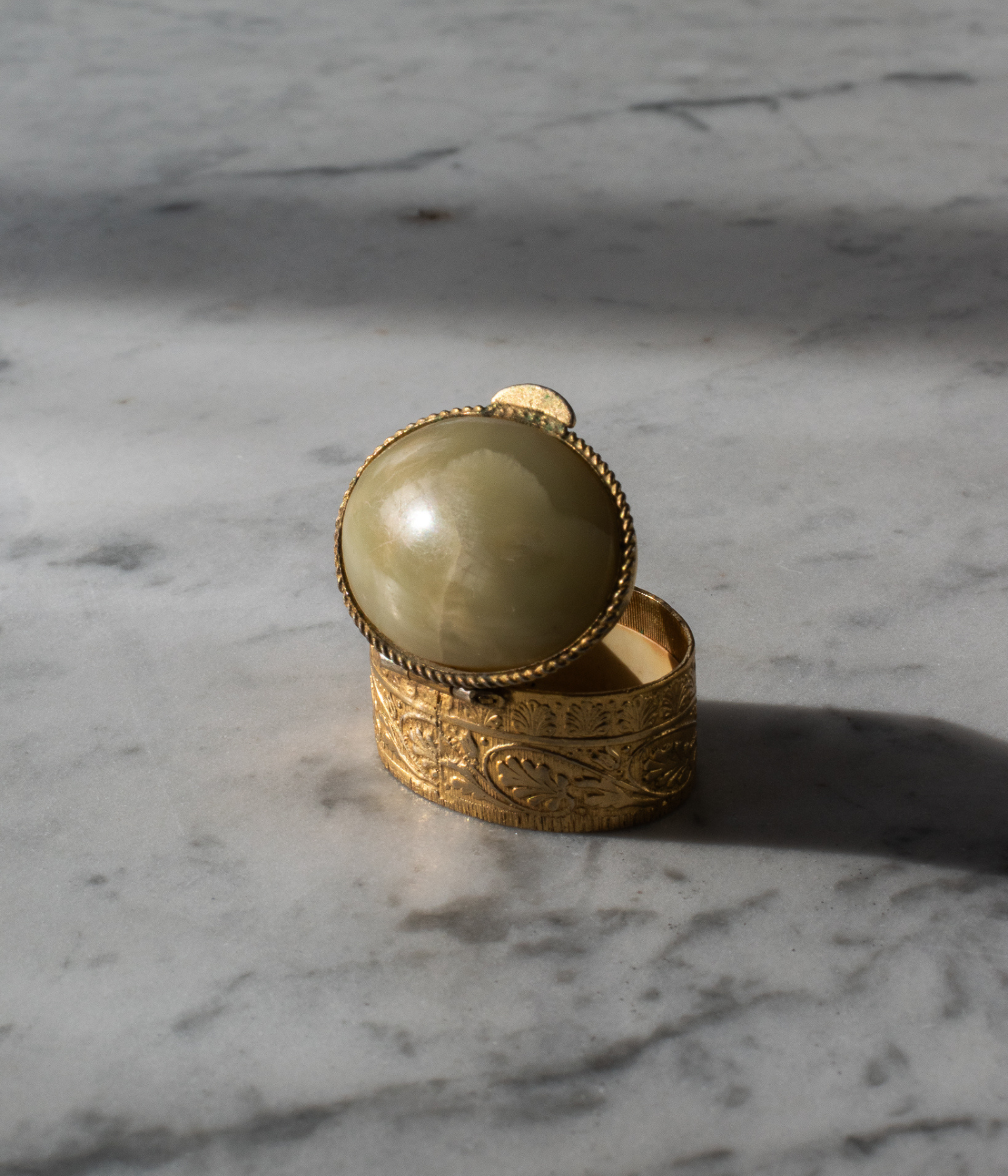 Vintage Gilt Trinket Box with Onyx Cabochon Lid