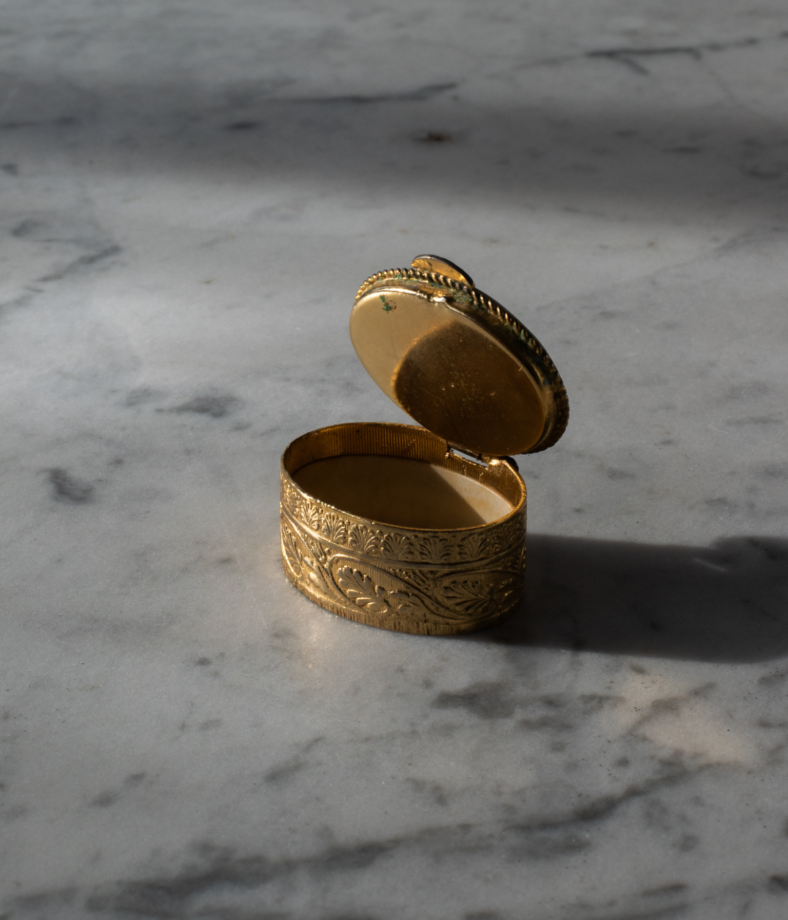 Vintage Gilt Trinket Box with Onyx Cabochon Lid