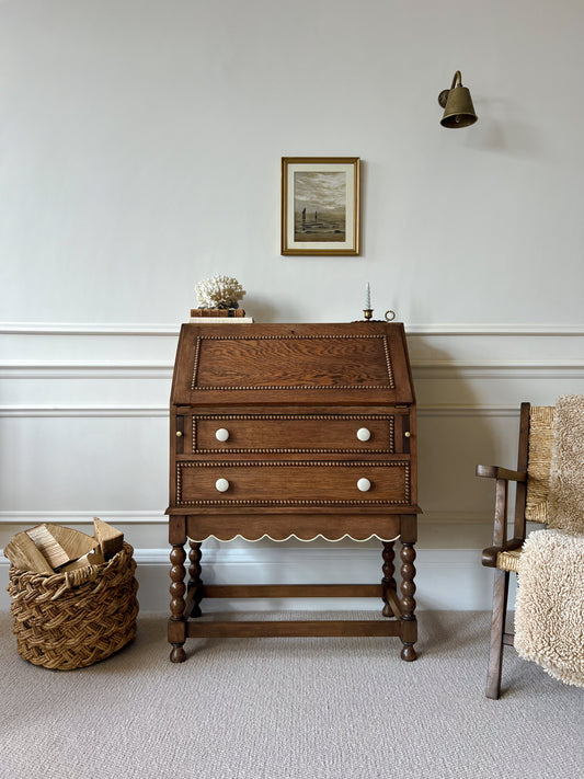 Antique Solid Oak Bureau With A Scalloped Edge & Bobbin Trim